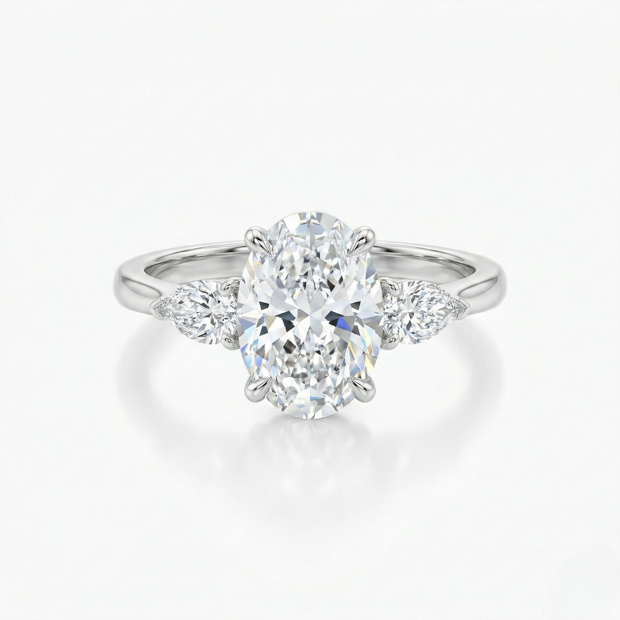 Oval & Pear Cut 3 Stones Ring