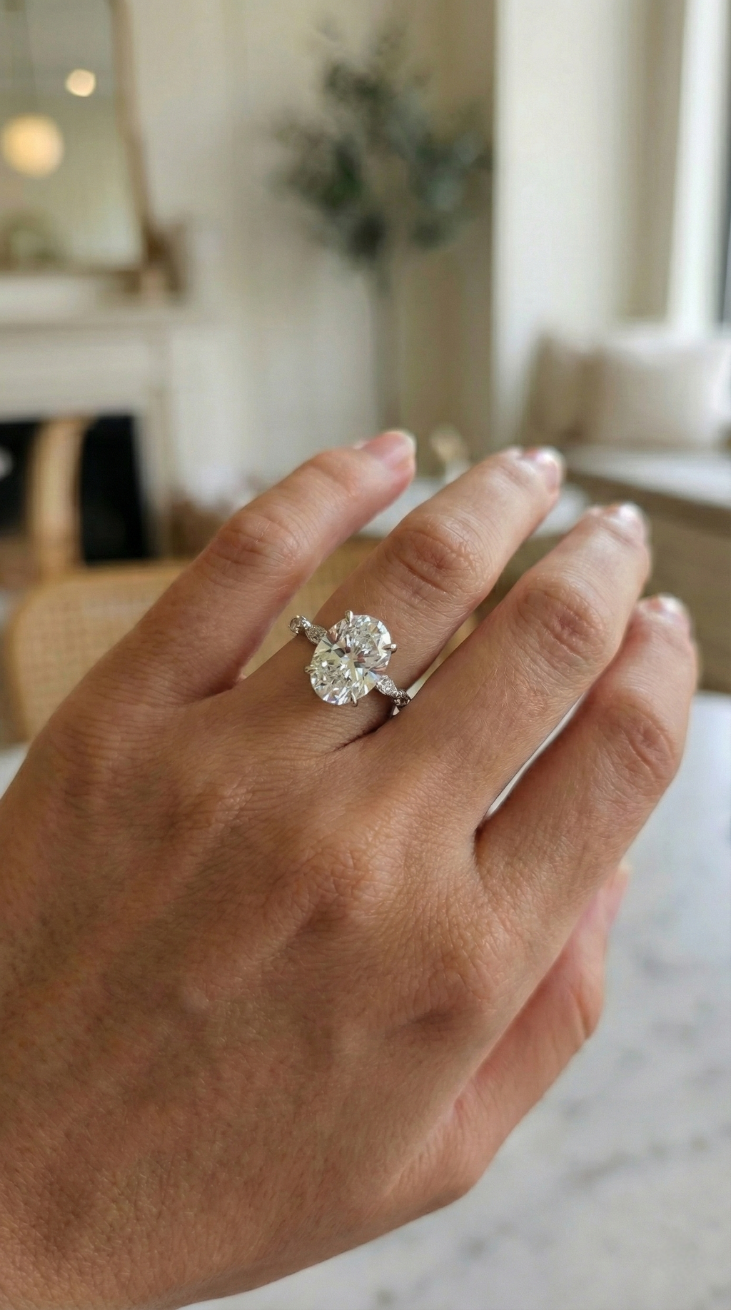 Oval-Cut Ring with Marquise & Round Diamonds