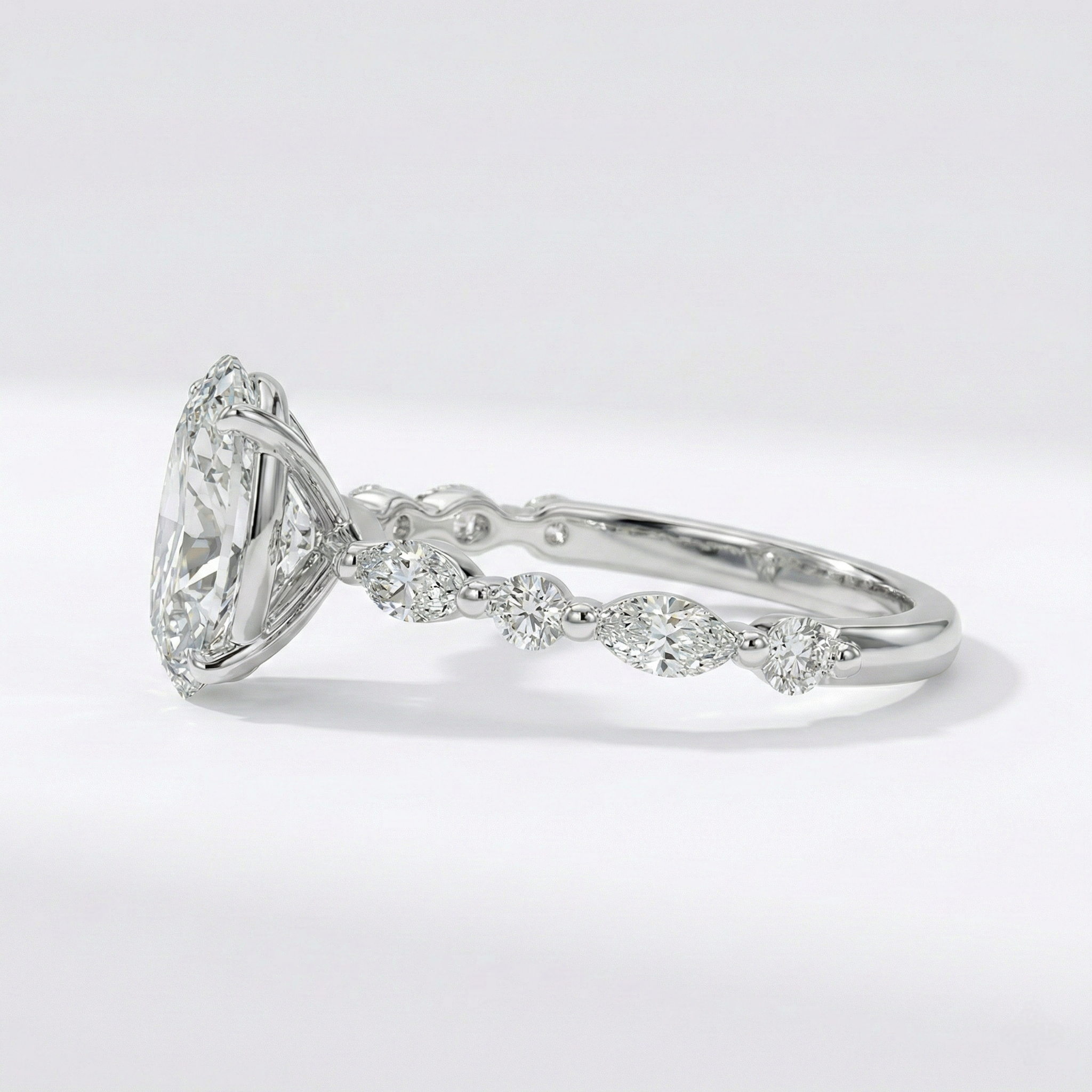 Oval-Cut Ring with Marquise & Round Diamonds