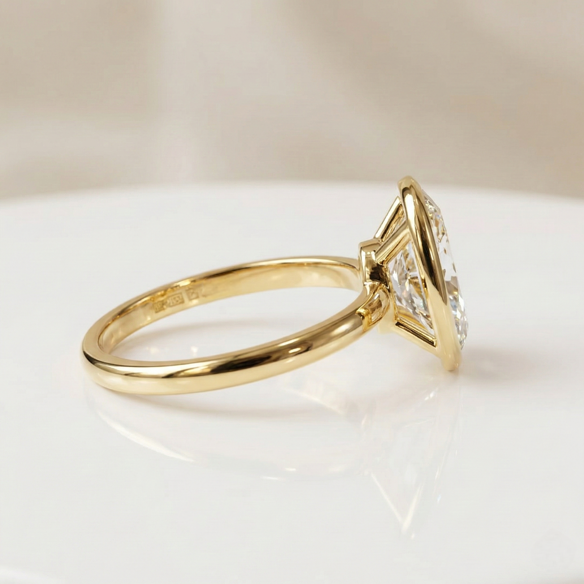 Oval-Cut Bezel Set Ring