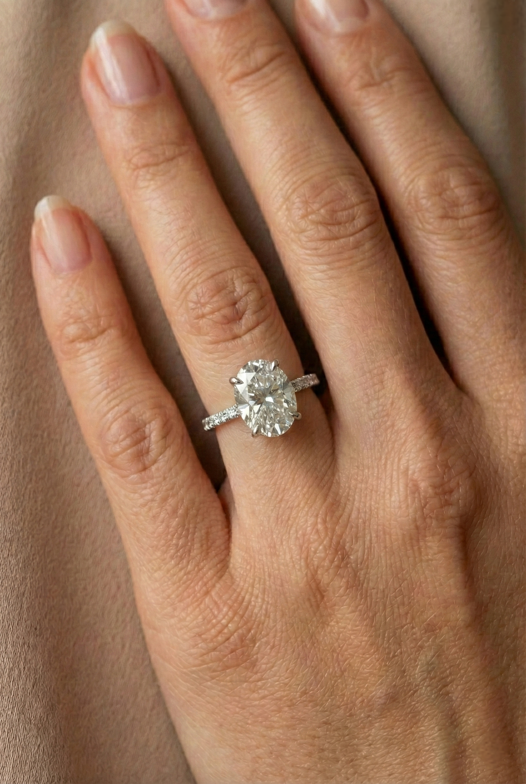 Oval Diamond Ring with Hidden Halo and Pavé Band