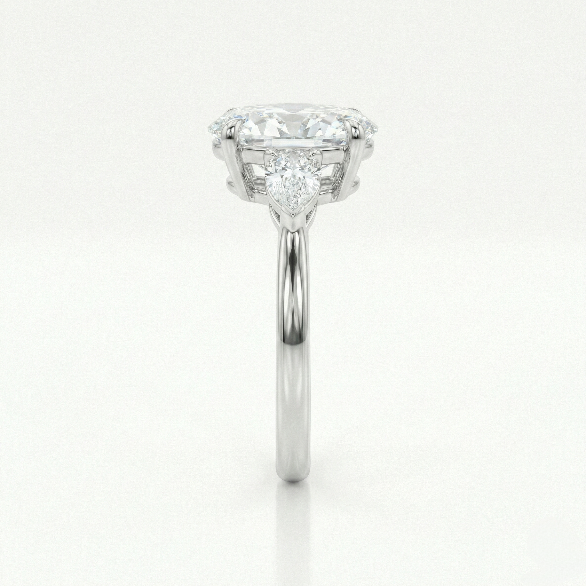 Oval & Pear Cut 3 Stones Ring