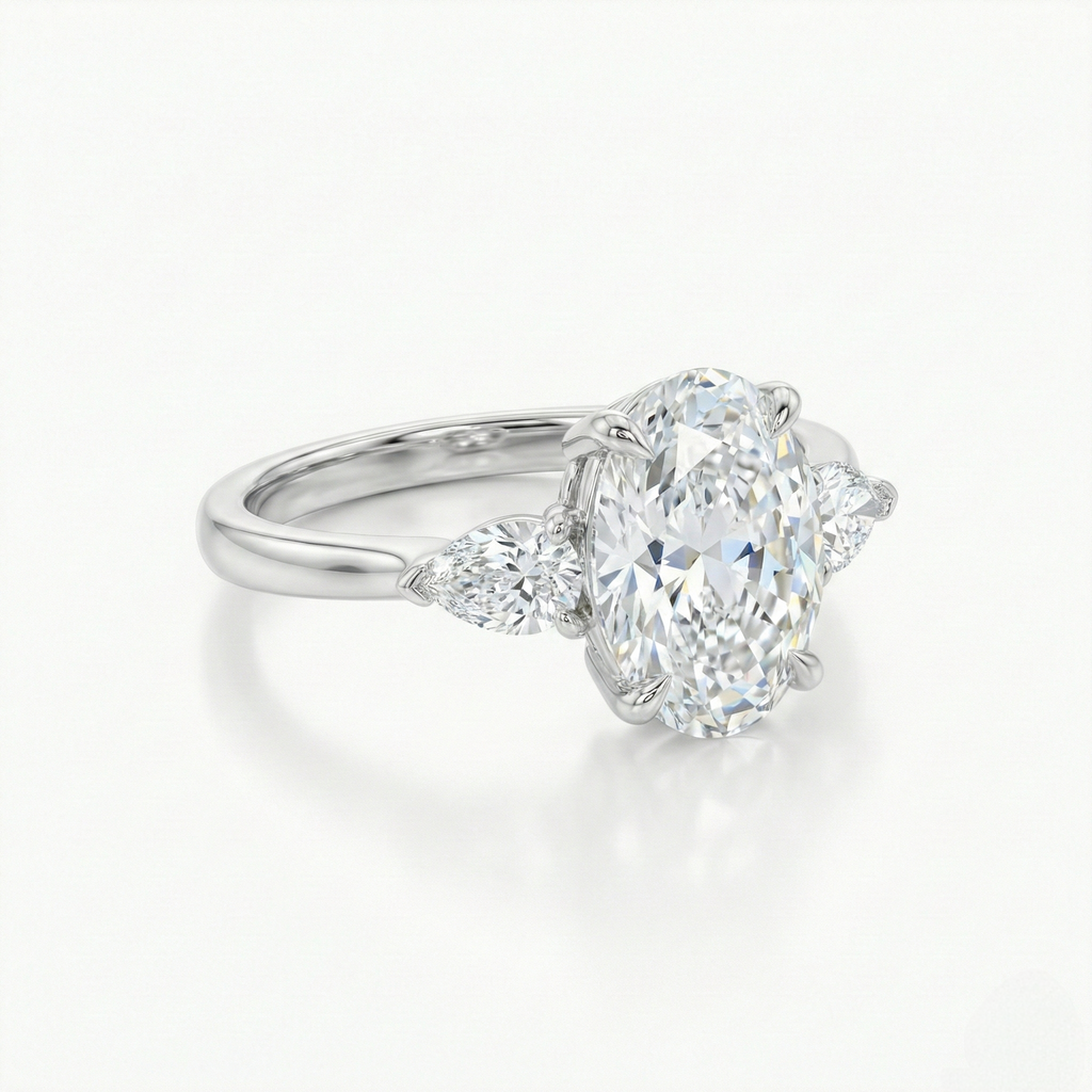 Oval & Pear Cut 3 Stones Ring