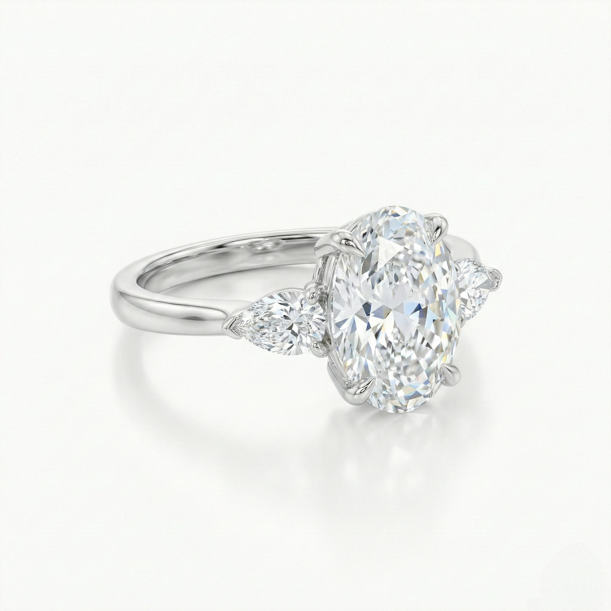 Oval & Pear Cut 3 Stones Ring