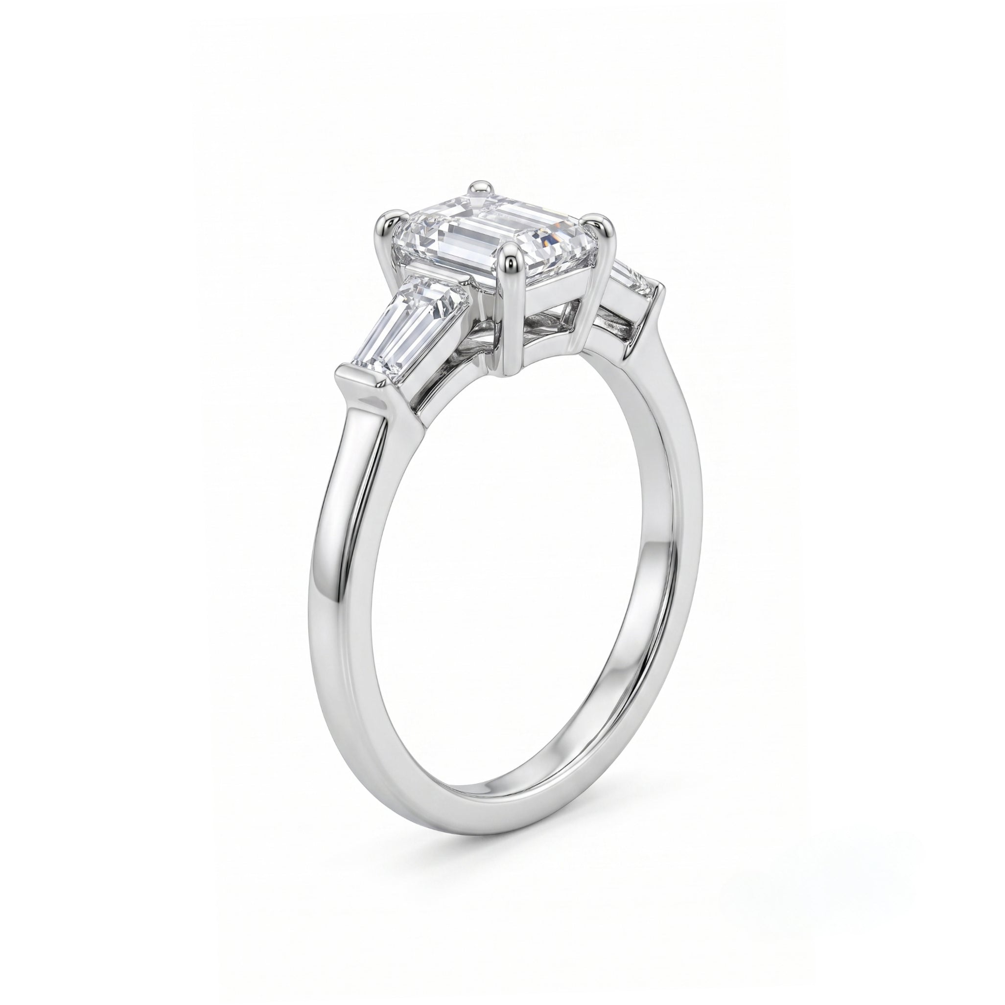 Emerald Cut Three Stone Ring with Tapered Baguettes