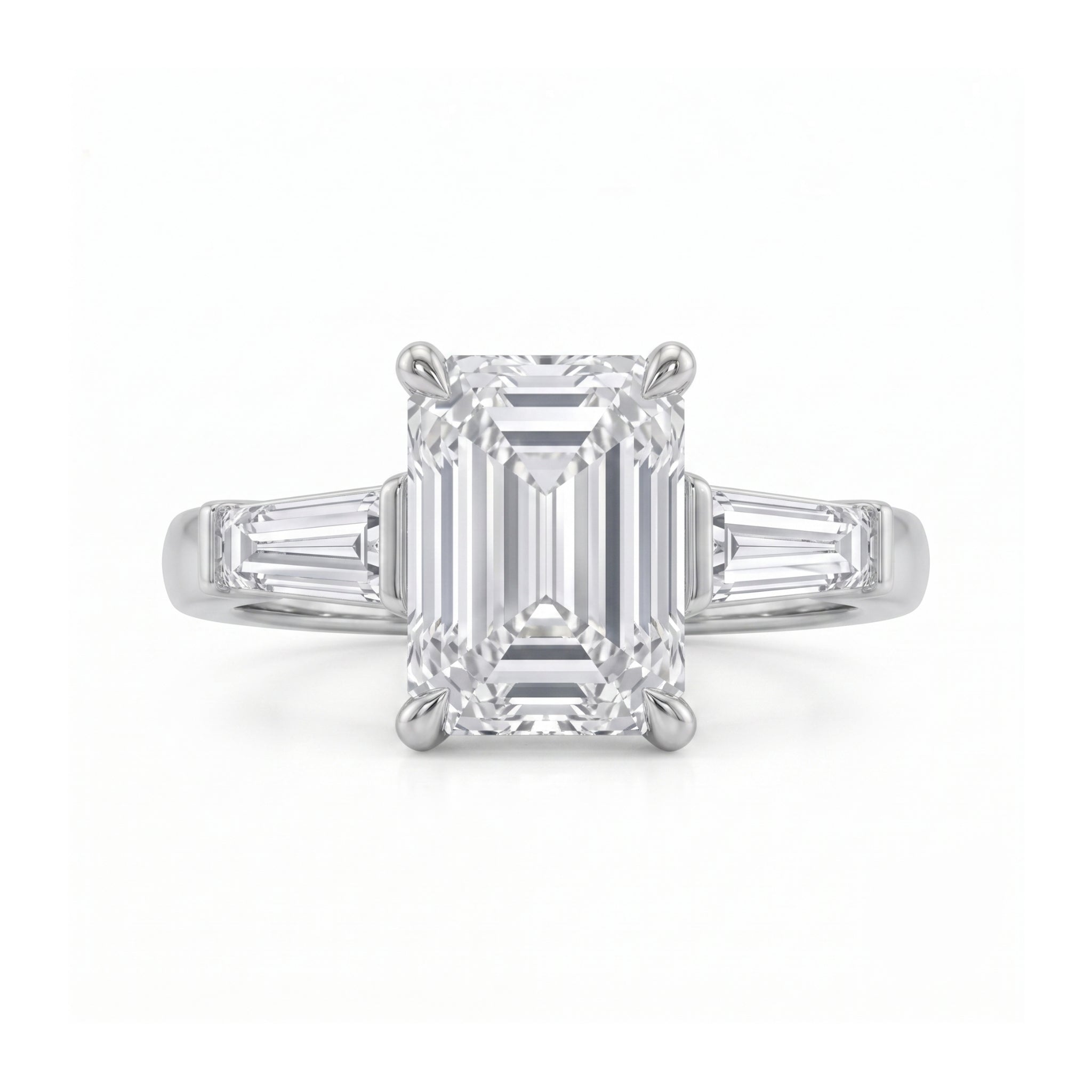 Emerald Cut Three Stone Ring with Tapered Baguettes