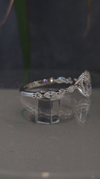 Oval-Cut Ring with Marquise & Round Diamonds