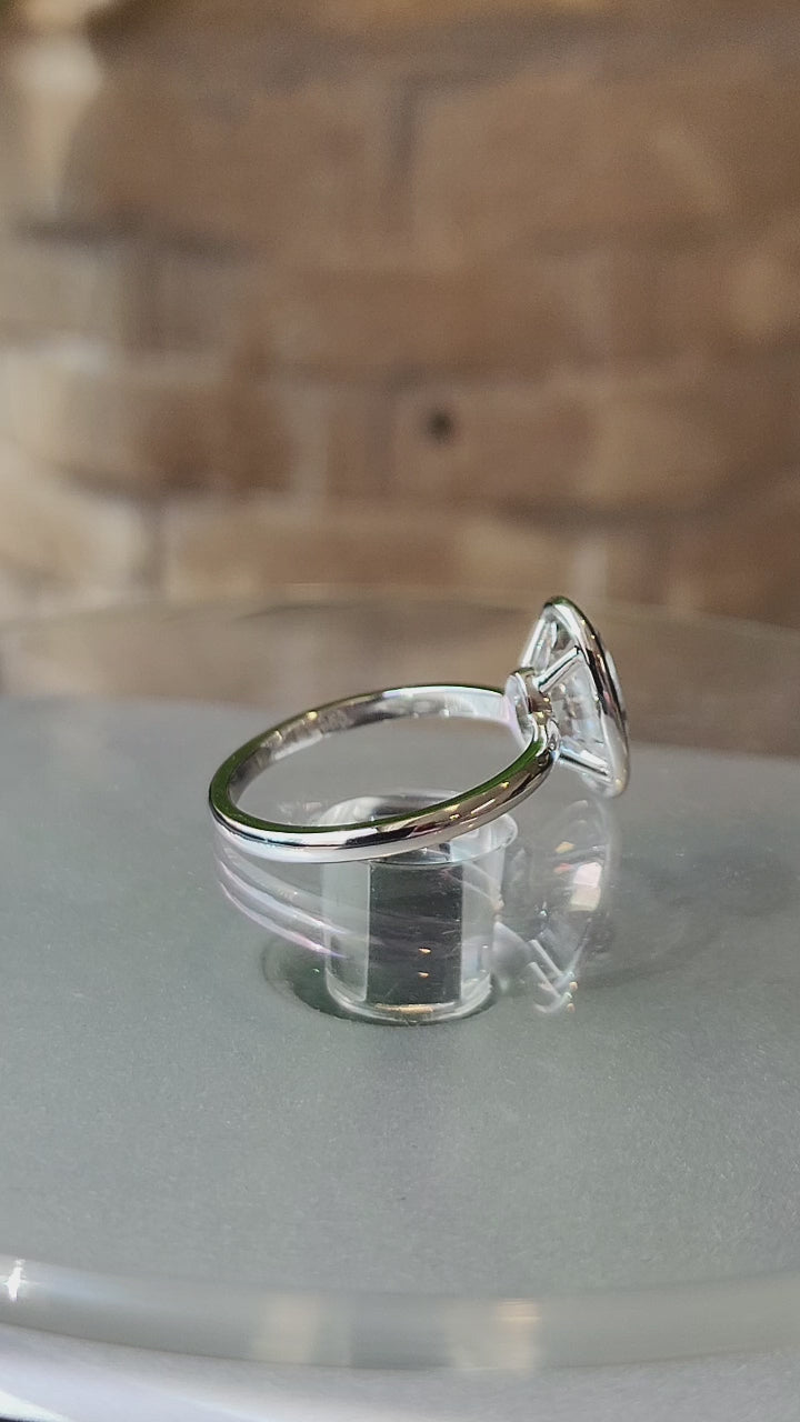 Oval-Cut Bezel Set Ring